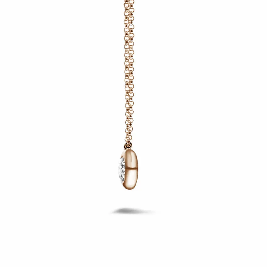 0.70 quilates colgante diamante satélite en oro rojo 