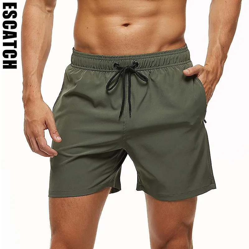 2023 Pantalones de baño elásticos para hombres Pantalones cortos de playa de secado rápido con bolsillos con cremallera y forro 