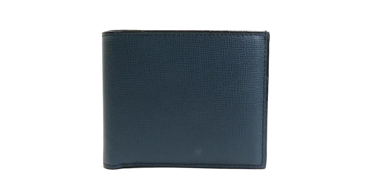 Billetera bifold de cuero azul marino Valextra 