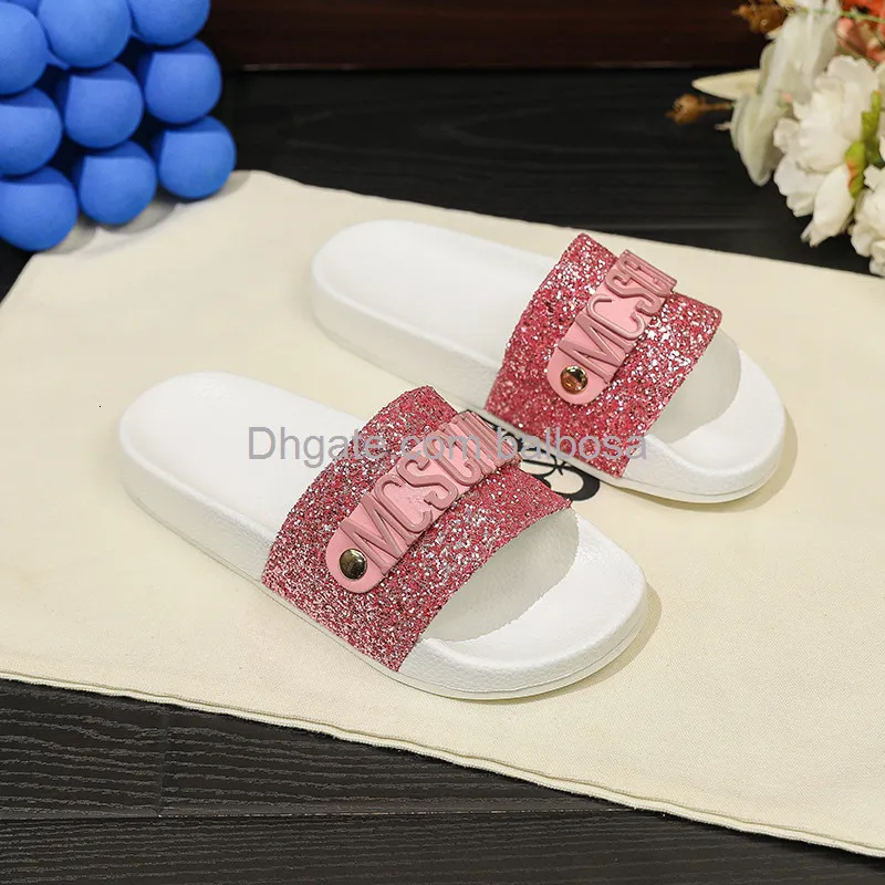 Diseñador sandalias para mujer cartas de hardware decorativo espíritu de espiga diapositivas zapatillas de lujo moda para mujere