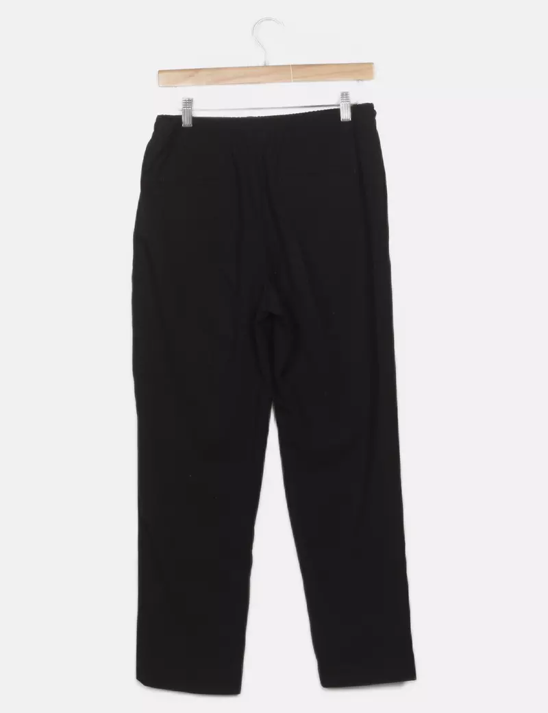 Mango Pantalones de tela Fluido