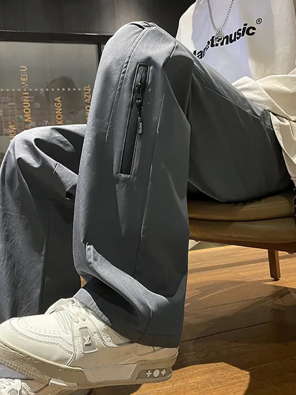 Pantalones cargo rectos impermeables con diseño de cremallera para hombre