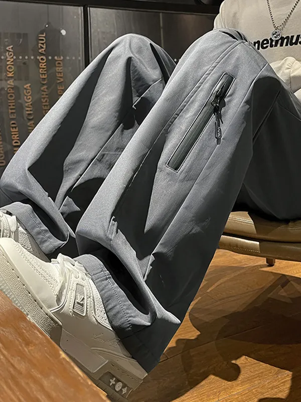 Pantalones cargo rectos impermeables con diseño de cremallera para hombre