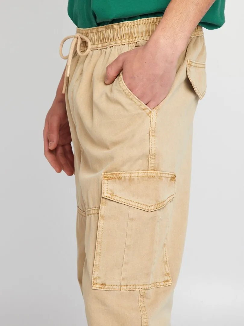 PANTALóN CON BOLSILLOS EN LOS LATERALES  BEIGE