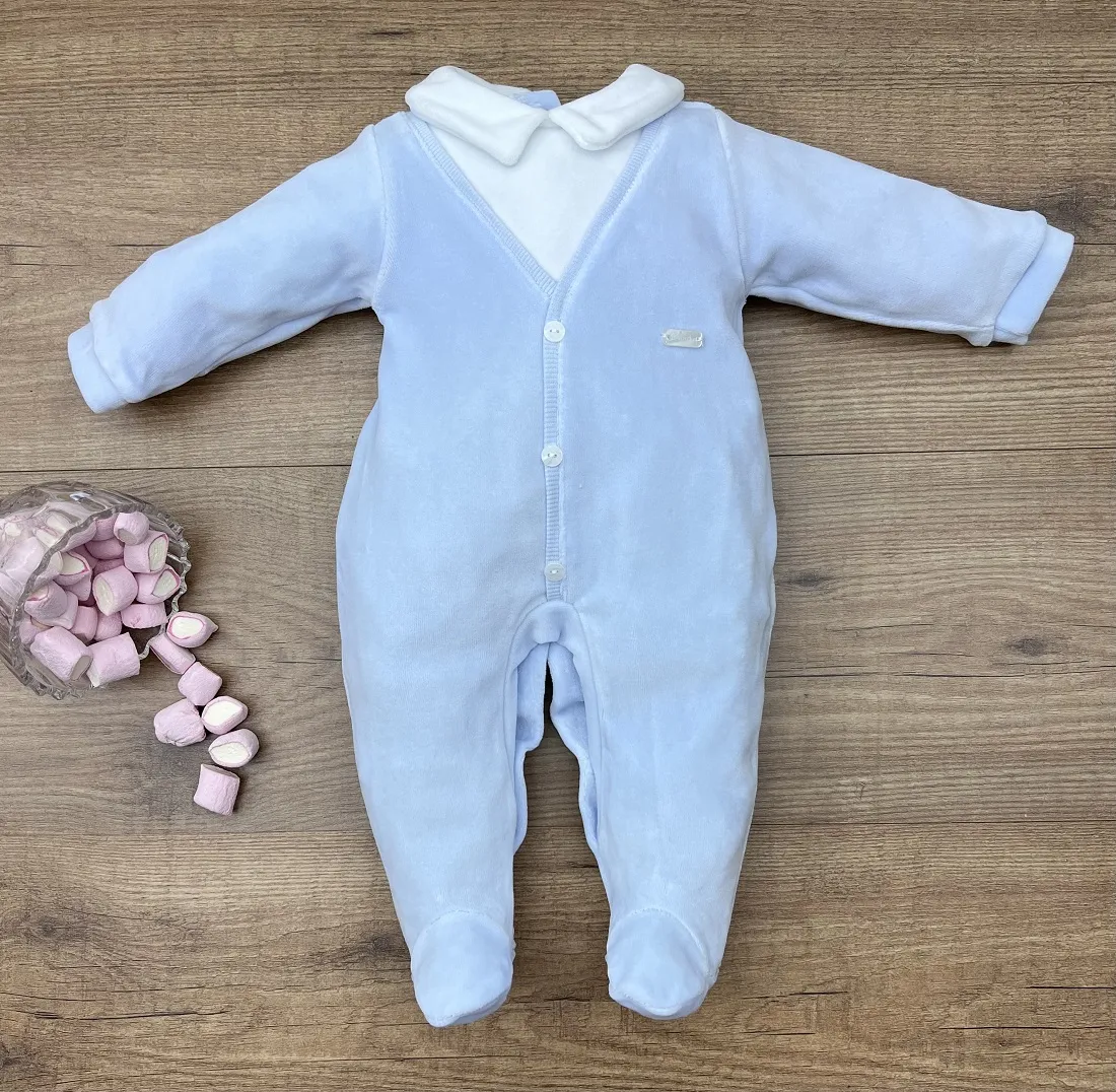 Sheer romper in blue with white.